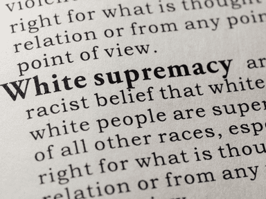 A close up of the word white supremacy